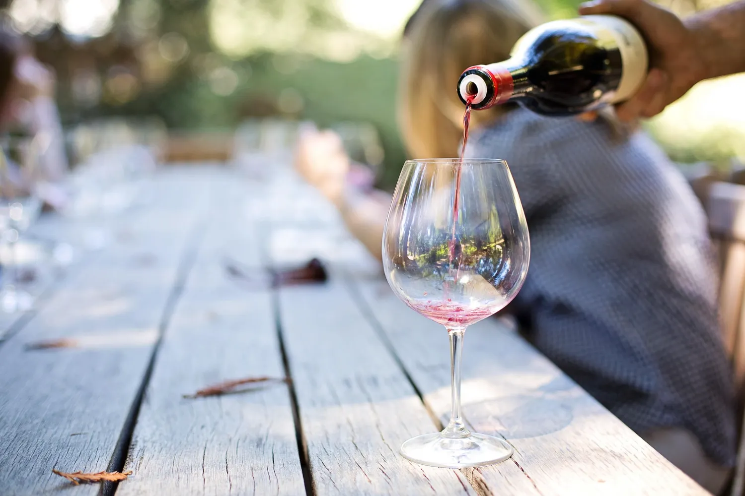 Wine being poured during a tasting at a Niagara-on-the-Lake winery